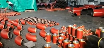 CUSTOM-PIPE-FITTINGS-SHIPPED-TO-INDONESIA-ARE-PAINTED-RED.